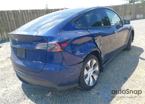 2023 Tesla Model Y Awd/Long Range Dual Motor All-Wheel Drive z USA, uszkodzony, nr VIN 7SAYGDEE6PF851180